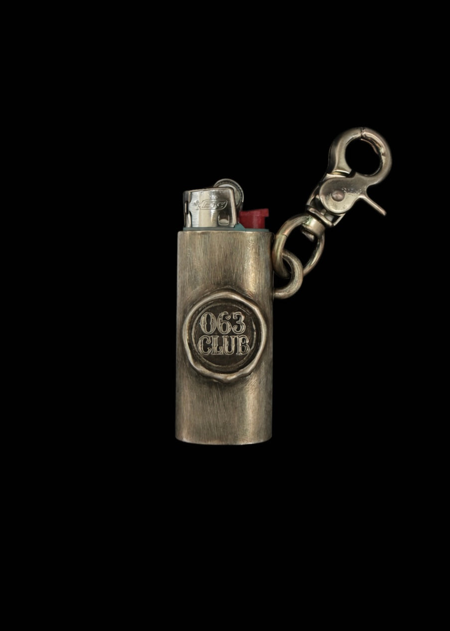 26FW 063CLUB BADGE A LIGHTER CASE